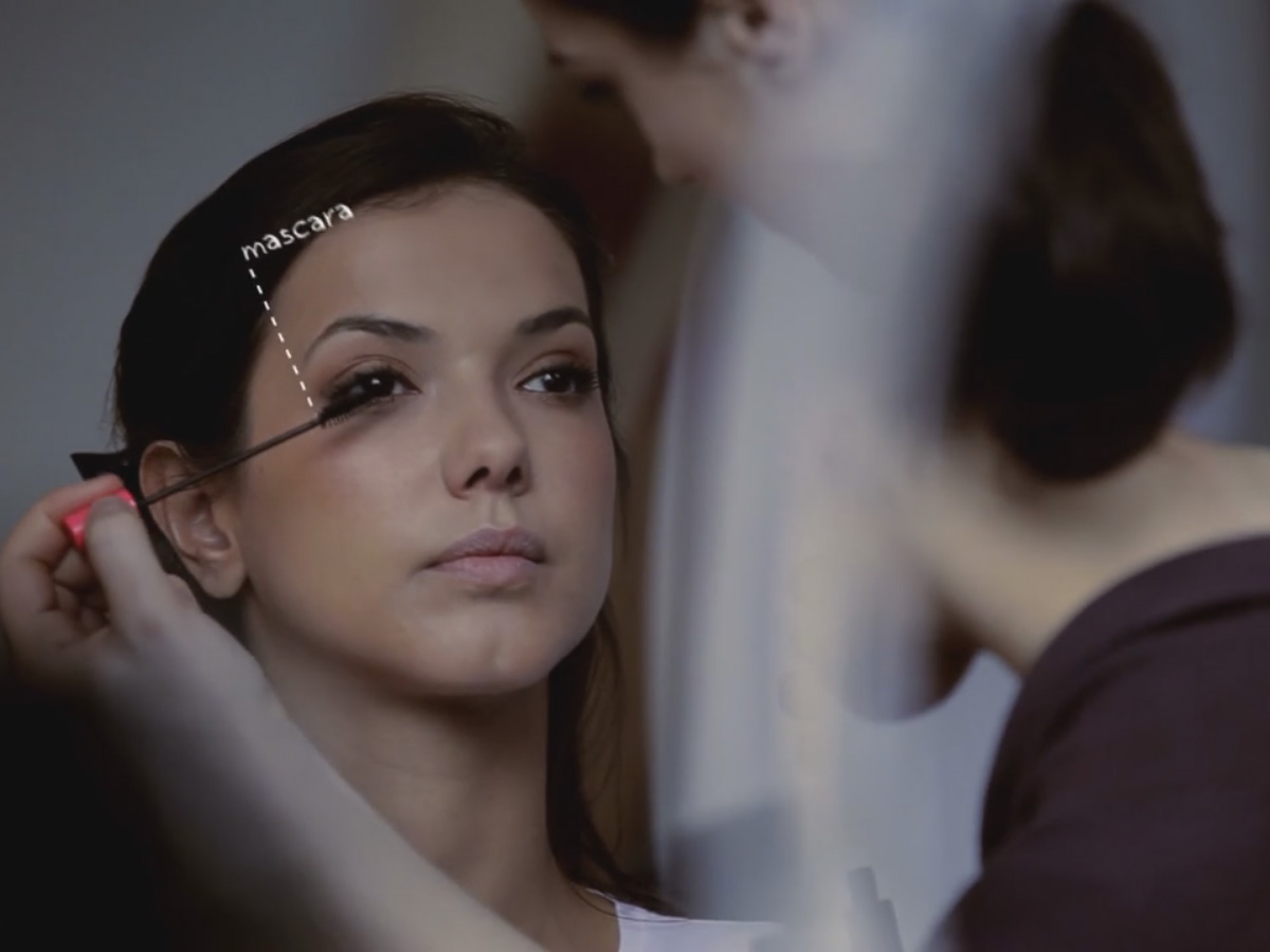 motion tracking Mascara being applied to the eyelashes of a young female