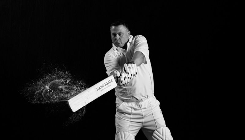 Visual effects Cricketer hitting a ball with a bat that explodes into water