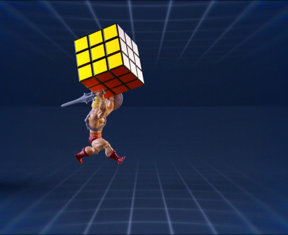 still image from the 3D projection mapping animation showing top-selling 80s toys He-Man and a Rubik's Cube
